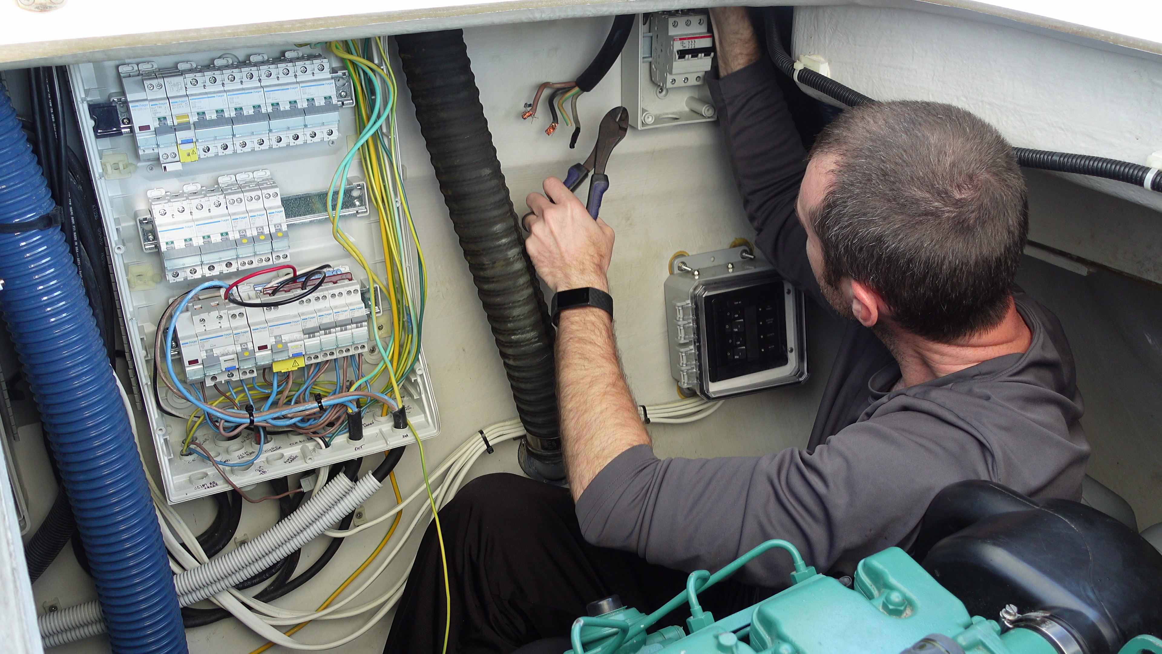 David working in the engine room of Starry Horizons