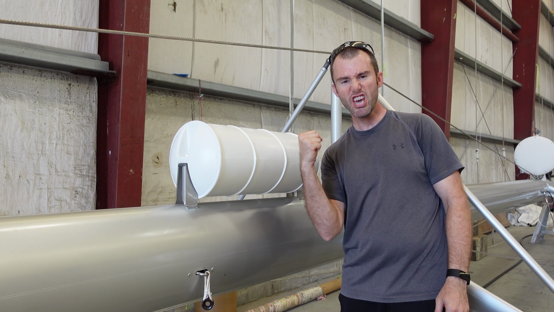 Working on the mast of a sailboat during a refit