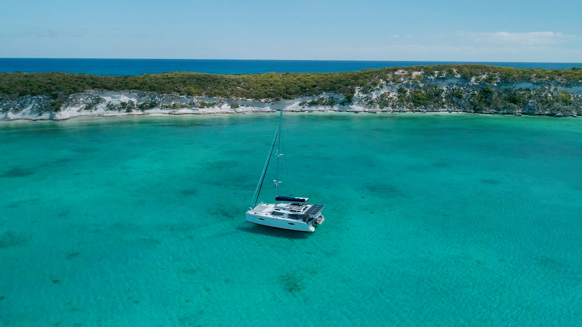 Catamaran anchored in a remote anchorage