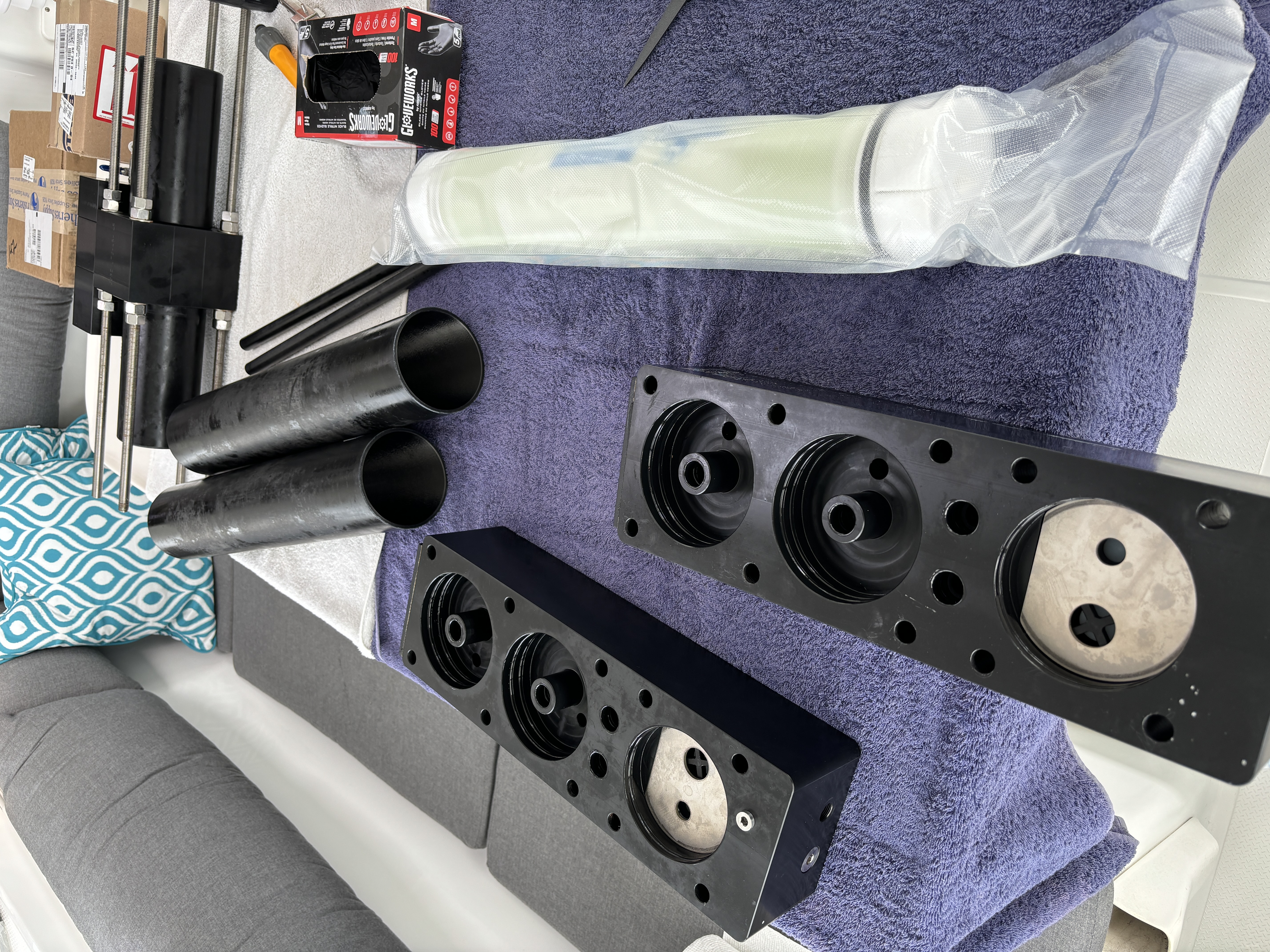Watermaker disassembled on the cockpit table for repairs